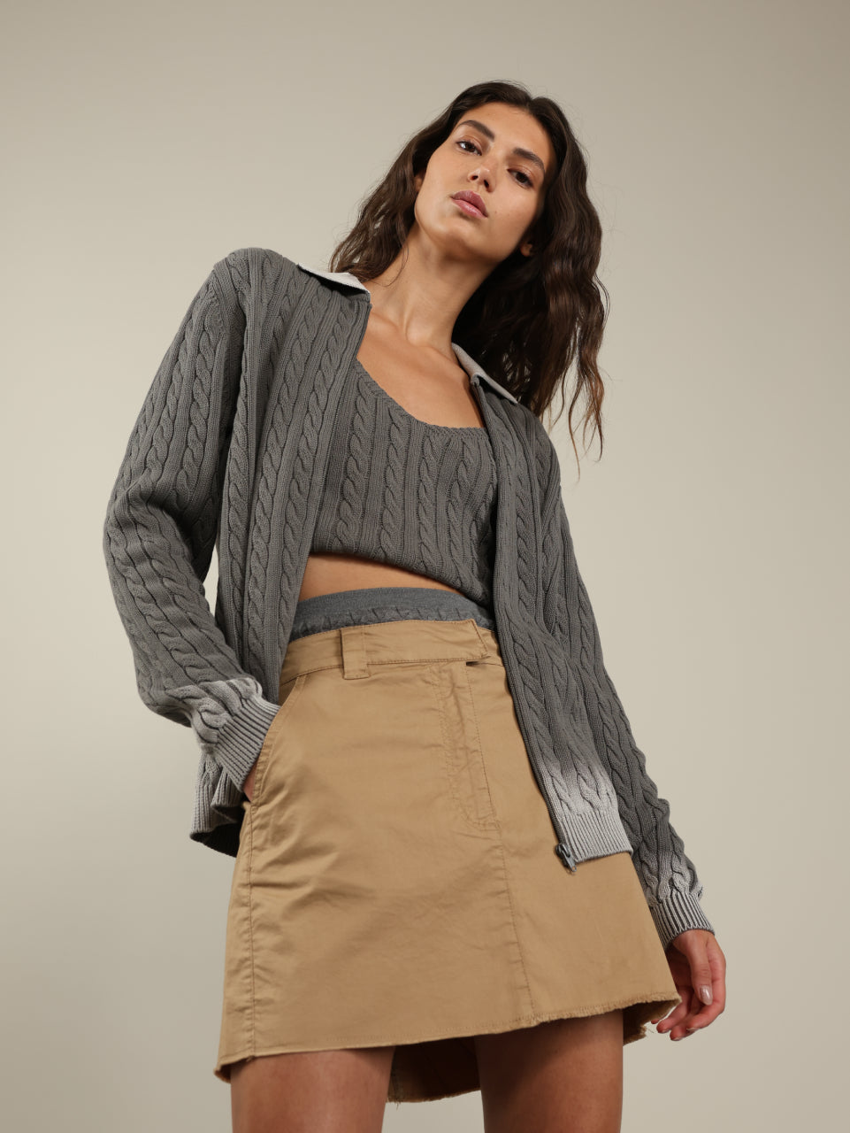 Knitted cardigan with braids