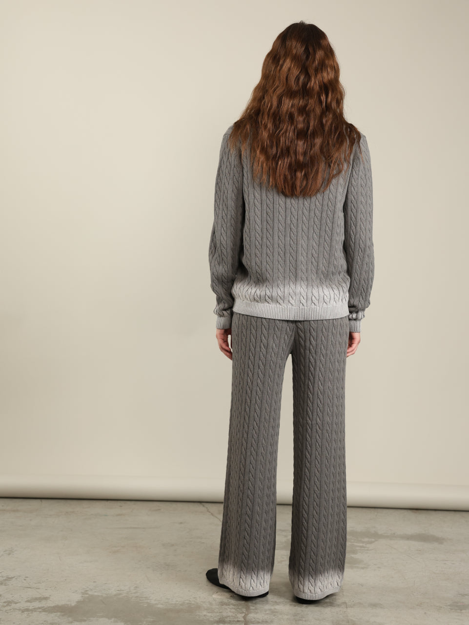 Knitted cardigan with braids