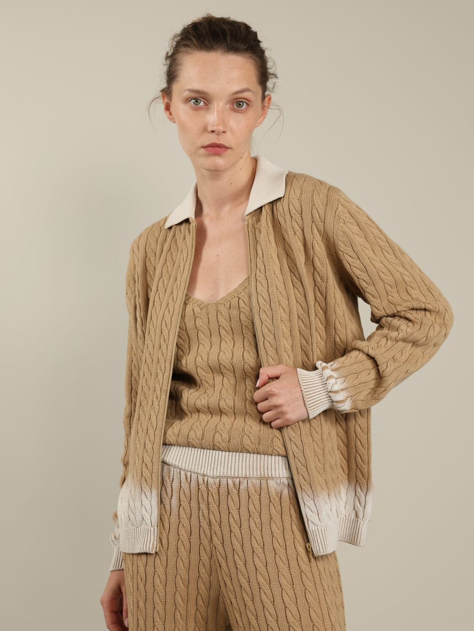 Knitted cardigan with braids