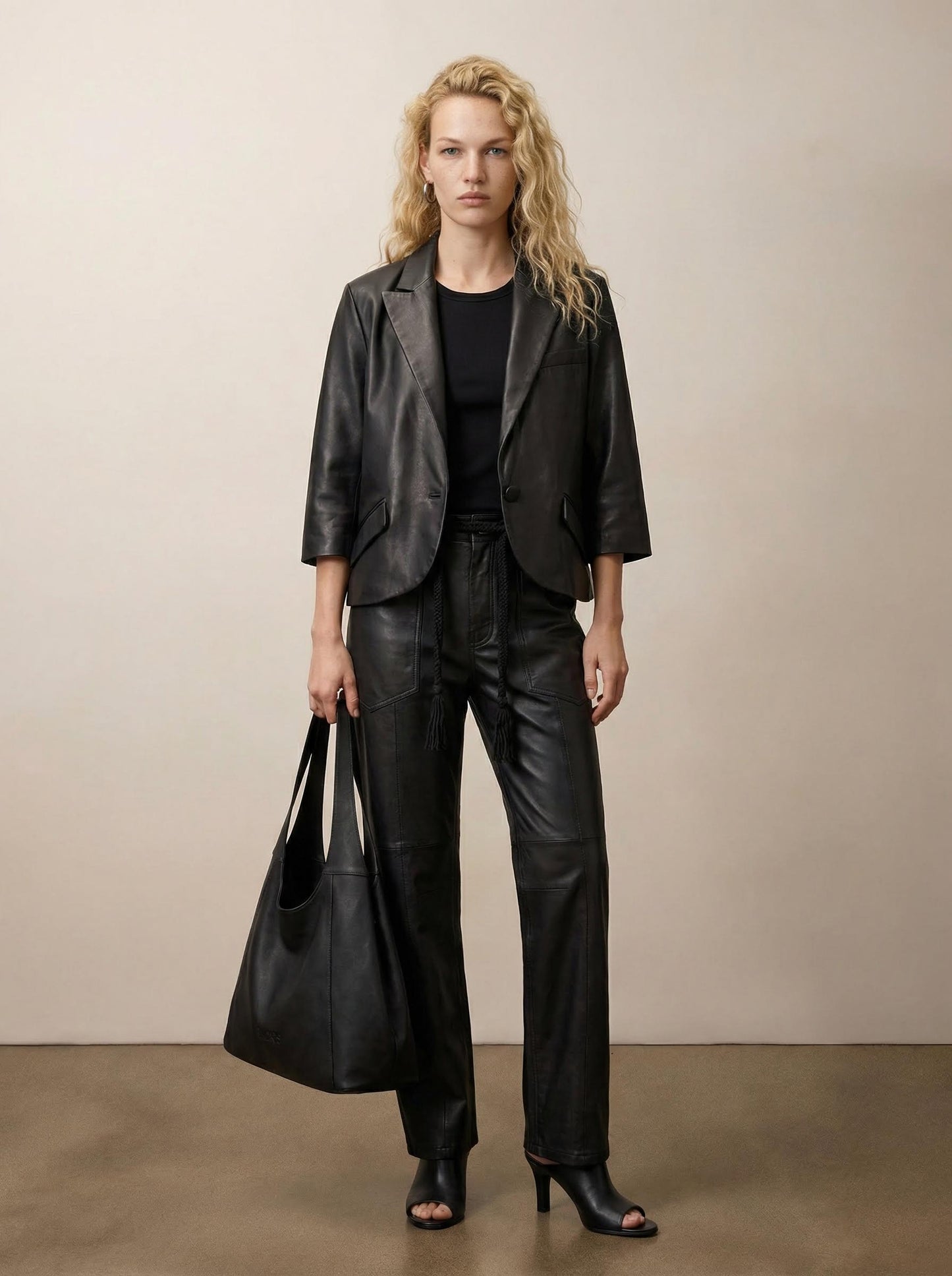 Barrel leather pants with a belt