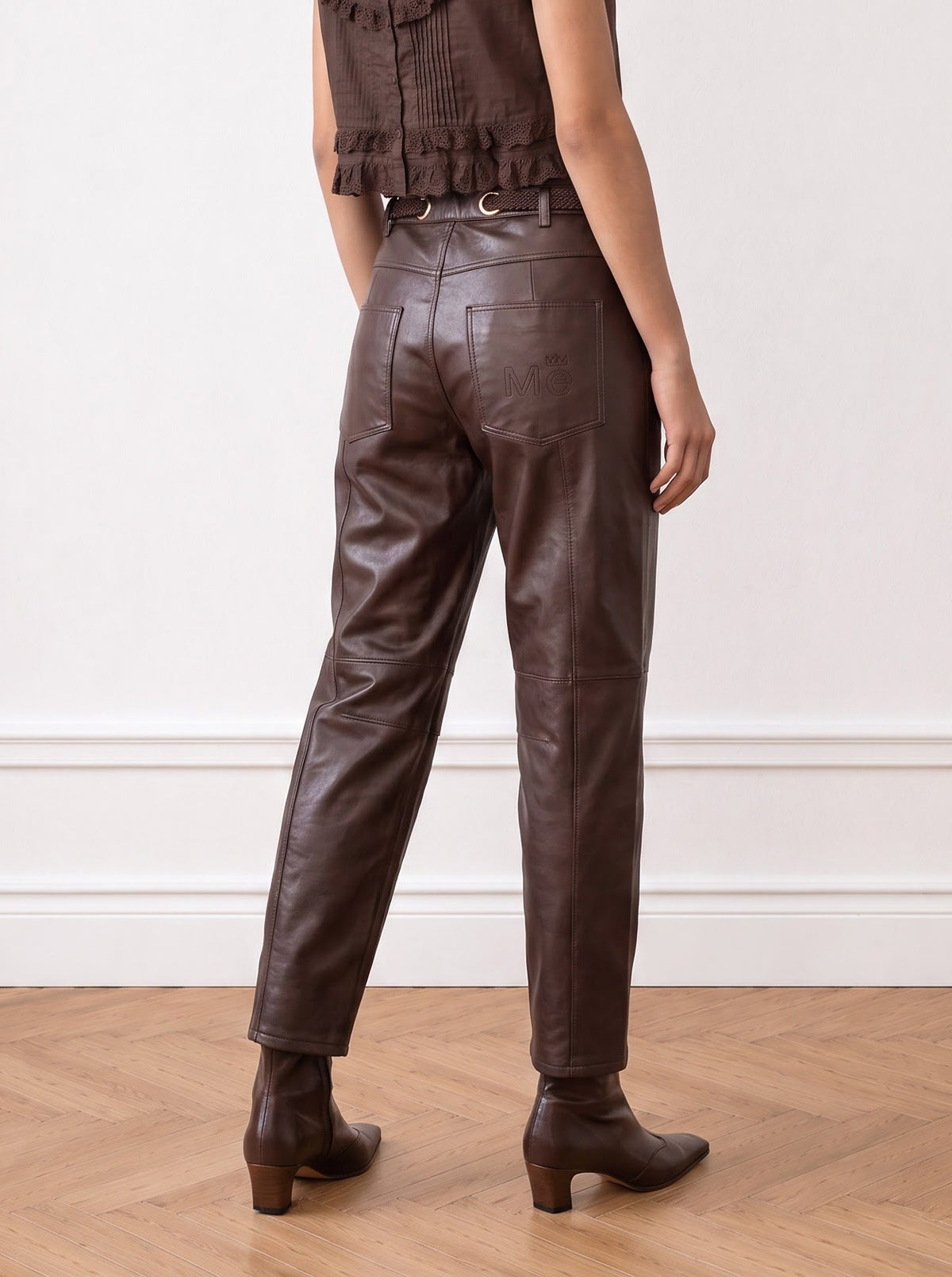 Belted barrel-leg leather trousers