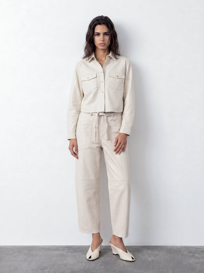 Belted barrel-leg leather trousers